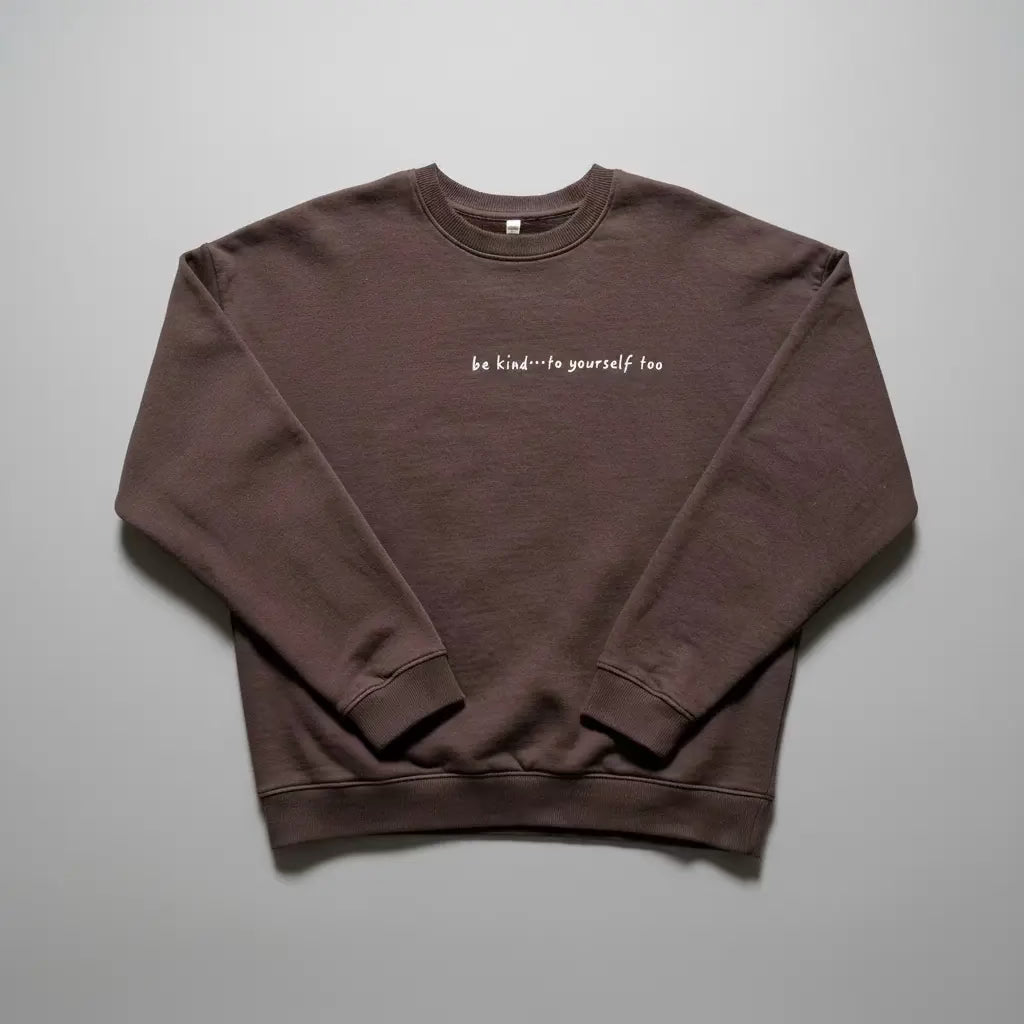 Chocolate brown sweatshirt with 'be kind... to yourself too' text on front chest