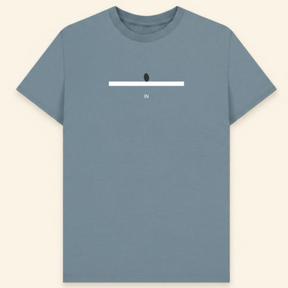 Blue t-shirt with a minimalistic design on a beige background