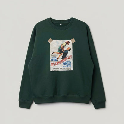 Green sweatshirt with a graphic design on a gray background