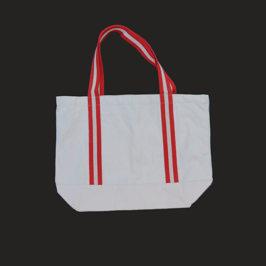 White tote bag with red handles