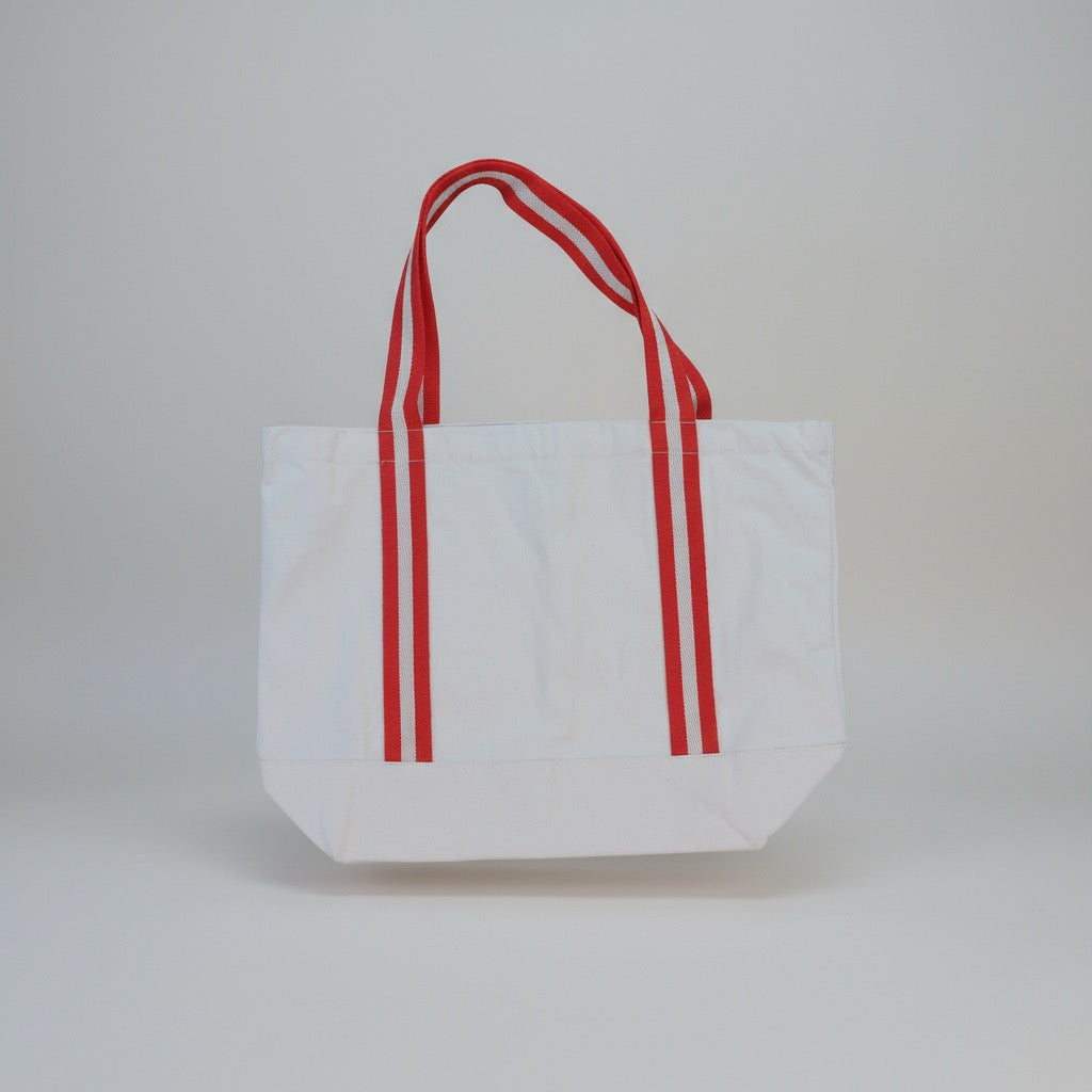 White tote bag with red stripes on a light gray background