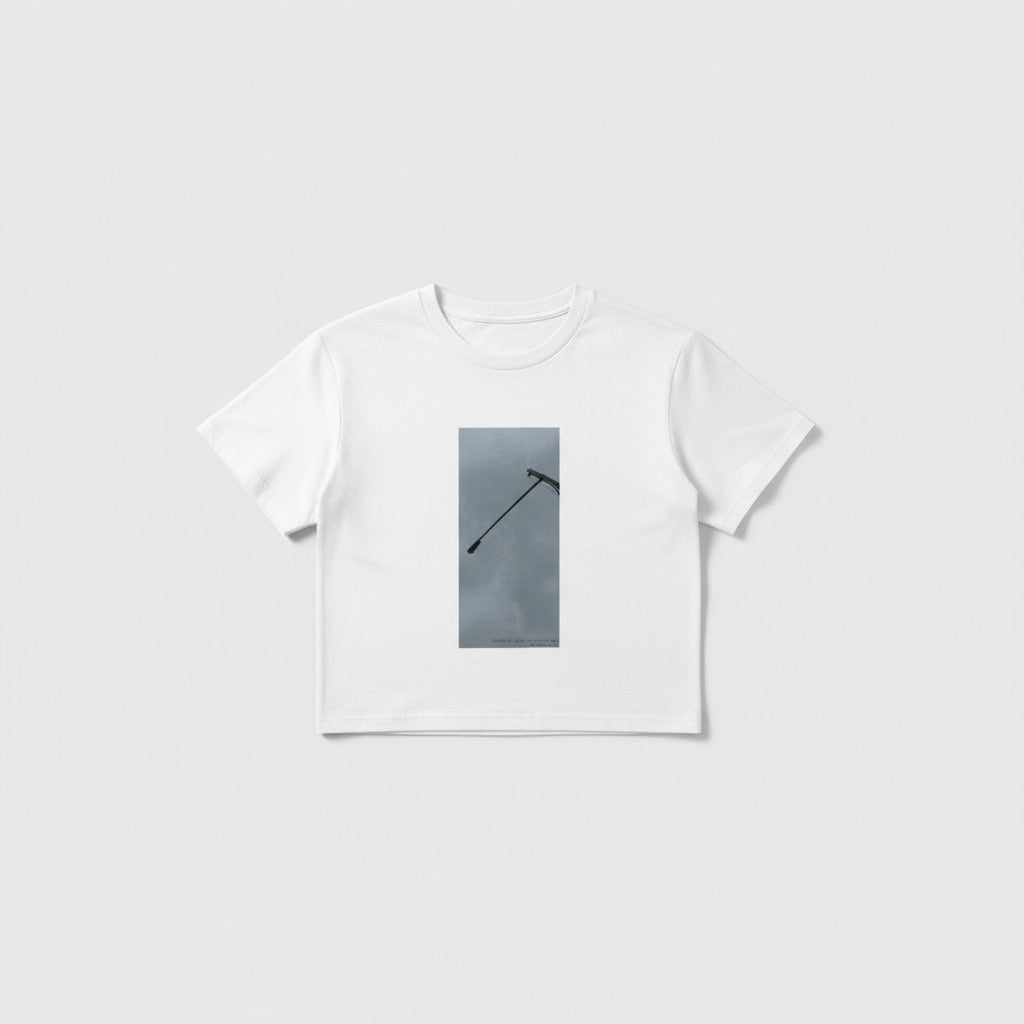 White t-shirt with a small graphic on a white background
