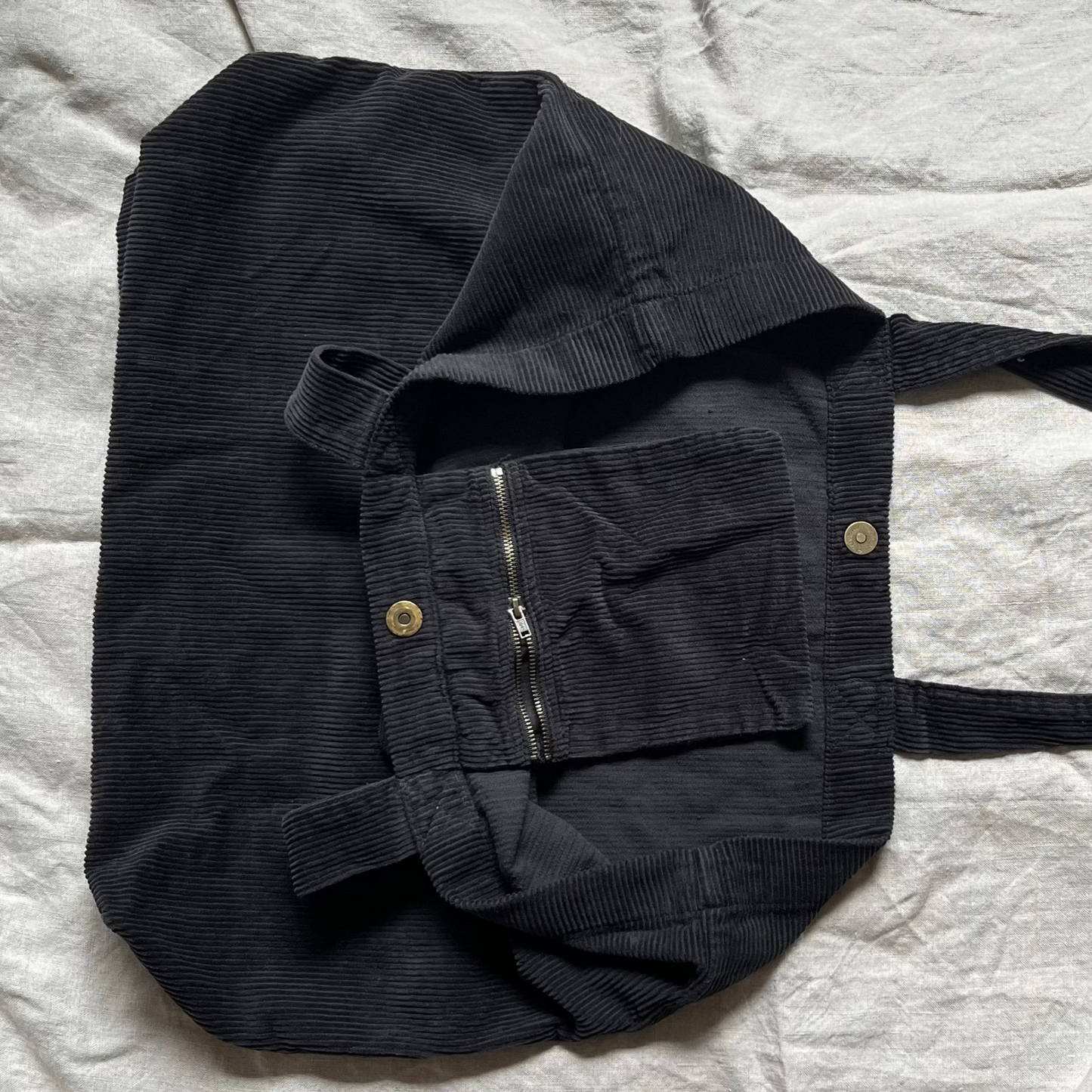 Black corduroy tote bag pocket close up