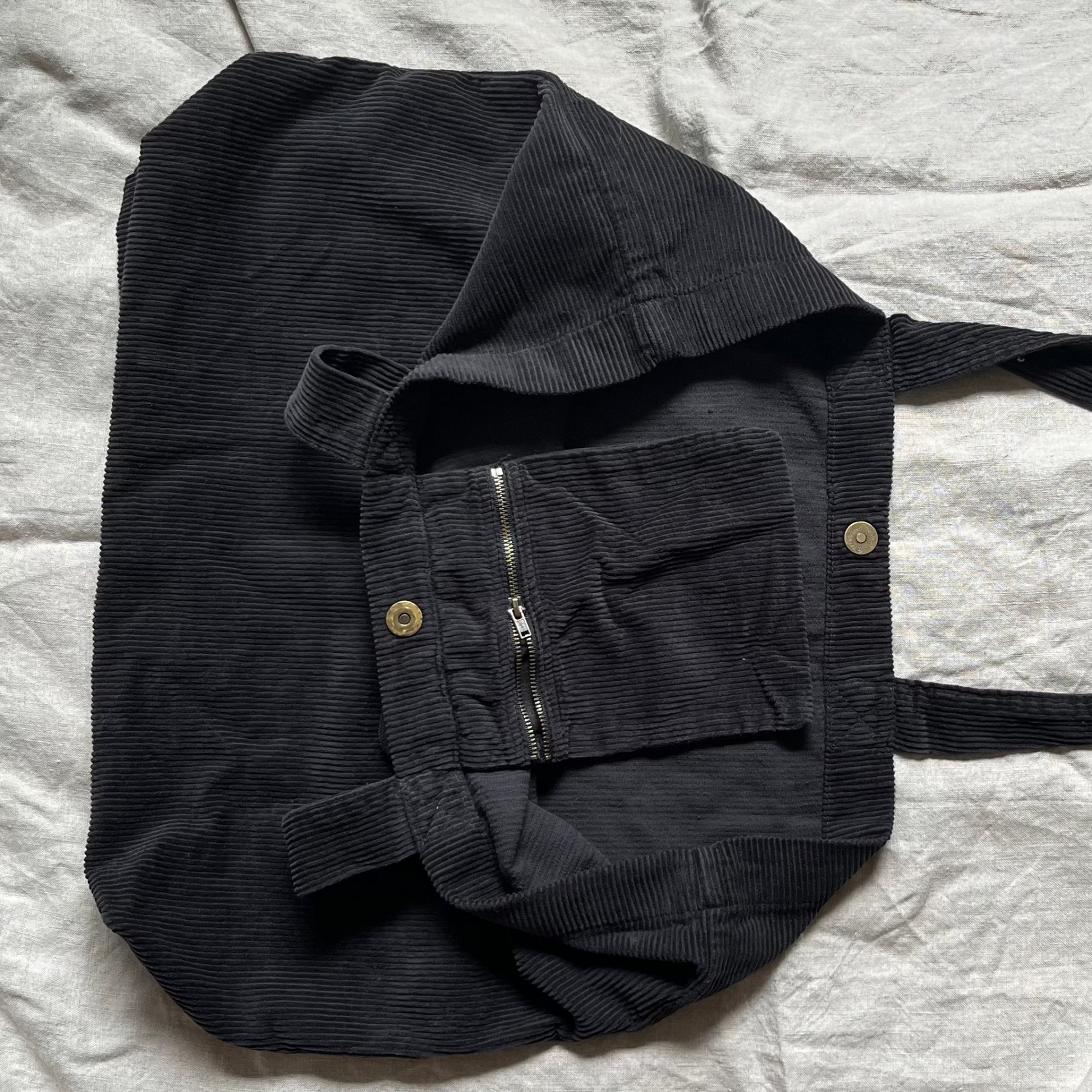 Black corduroy tote bag pocket close up