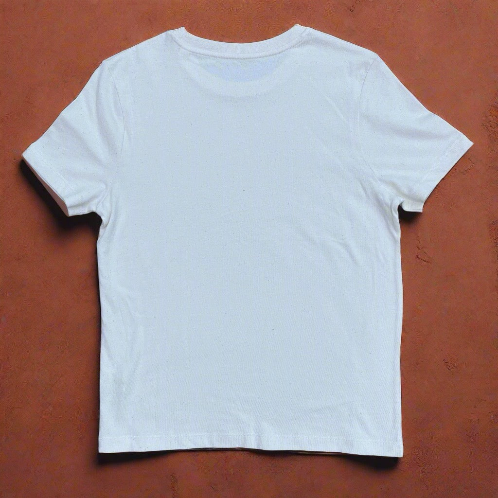 White t-shirt on a brown surface