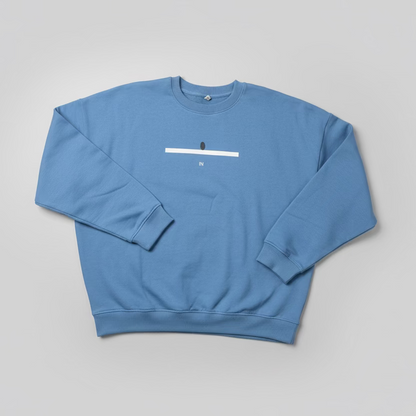 Blue sweatshirt with a line and a tennis ball mark on the chest