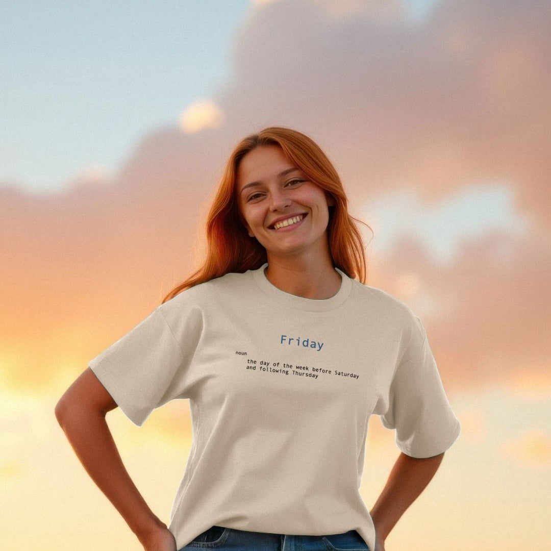 Woman wearing a t-shirt with 'Friday' text against a sunset background